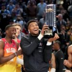 
              Giannis Antetokounmpo hold up the winning team trophy after the NBA basketball All-Star game Sunday, Feb. 19, 2023, in Salt Lake City. (AP Photo/Rick Bowmer)
            