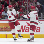
              Carolina Hurricanes right wing Stefan Noesen (23) celebrates with left wing Teuvo Teravainen (86) after scoring against the Washington Capitals during the second period of an NHL hockey game, Tuesday, Feb. 14, 2023, in Washington. (AP Photo/Jess Rapfogel)
            
