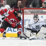 
              Los Angeles Kings goaltender Pheonix Copley, right, stops a shot on goal by New Jersey Devils' Erik Haula, left, during the first period of an NHL hockey game Thursday, Feb. 23, 2023, in Newark, N.J. (AP Photo/Frank Franklin II)
            