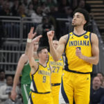 
              Indiana Pacers guard Chris Duarte (3) reacts to hitting a 3-point shot against the Boston Celtics during the first half of an NBA basketball game in Indianapolis, Thursday, Feb. 23, 2023. (AP Photo/AJ Mast)
            