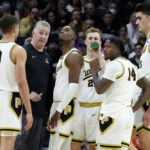 
              Purdue head coach Matt Painter, second from left, reacts as he talks with his team during the second half of an NCAA college basketball game against Northwestern in Evanston, Ill., Sunday, Feb. 12, 2023. (AP Photo/Nam Y. Huh)
            