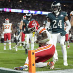 
              Kansas City Chiefs running back Jerick McKinnon, foreground, stops short of the goal line on a run against the Philadelphia Eagles during the second half of the NFL Super Bowl 57 football game, Sunday, Feb. 12, 2023, in Glendale, Ariz. (AP Photo/Ashley Landis)
            