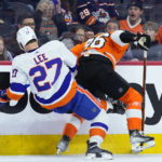 
              New York Islanders' Anders Lee, left, and Philadelphia Flyers' Joel Farabee collide during the second period of an NHL hockey game, Monday, Feb. 6, 2023, in Philadelphia. (AP Photo/Matt Slocum)
            