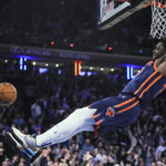 
              New York Knicks' Julius Randle dunks the ball  during the second half of an NBA basketball game against the Miami Heat, Thursday, Feb. 2, 2023, in New York. The Knicks won 106-104. (AP Photo/Frank Franklin II)
            
