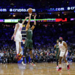 
              Boston Celtics' Jayson Tatum (0) goes up for the go-ahead shot against Philadelphia 76ers' De'Anthony Melton (8) during the final seconds of an NBA basketball game, Saturday, Feb. 25, 2023, in Philadelphia. (AP Photo/Matt Slocum)
            