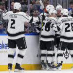 
              The Los Angeles Kings celebrate after right wing Arthur Kaliyev scored against the New York Islanders during the second period of an NHL hockey game Friday, Feb. 24, 2023, in Elmont, N.Y. (AP Photo/Mary Altaffer)
            