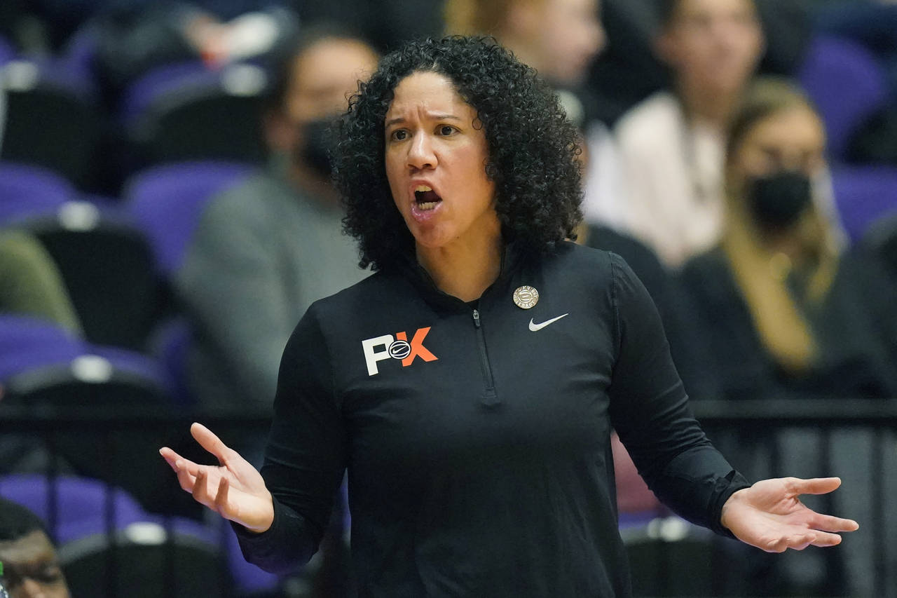 FILE - Duke head coach Kara Lawson shouts to her team during the second half of an NCAA college bas...