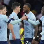 
              Brentford's Ivan Toney, centre right, celebrates with teammates after scoring his side's first goal goal during the English Premier League soccer match between Arsenal and Brentford at Emirates stadium in London, Saturday, Feb. 11, 2023. (AP Photo/Frank Augstein)
            