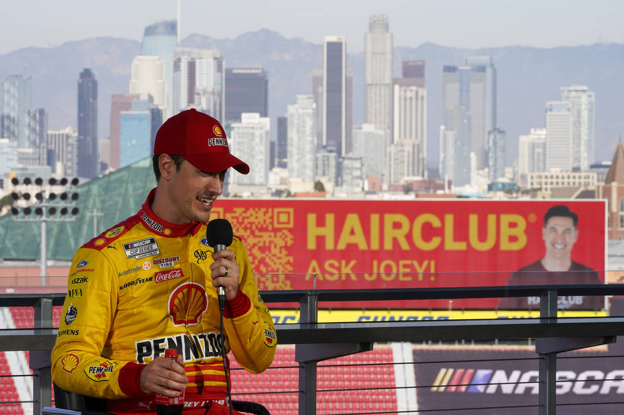 NASCAR Cup Series driver Joey Logano (22) speaks to reporters ahead of practice sessions before a N...