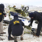 
              This photo provided by The National Transportation Safety Board shows NTSB investigators documenting the wreckage of a Pilatus PC-12 airplane at the crash site in Dayton, Nev., on Sunday, Feb. 26, 2023. A medical transport flight that crashed in a mountainous area in northern Nevada, killing five all five people aboard the plane including a patient, apparently broke apart before hitting the ground, authorities said Sunday. (NTSB via AP)
            
