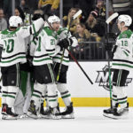 
              The Dallas Stars celebrate an overtime win against the Vegas Golden Knights in an NHL hockey game Saturday, Feb. 25, 2023, in Las Vegas. (AP Photo/David Becker)
            