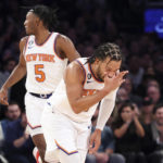 
              New York Knicks guard Jalen Brunson gestures after making a three point shot against the Brooklyn Nets as New York Knicks guard Immanuel Quickley (5) watches during the first half of an NBA basketball game, Monday, Feb. 13, 2023, in New York. (AP Photo/Jessie Alcheh)
            