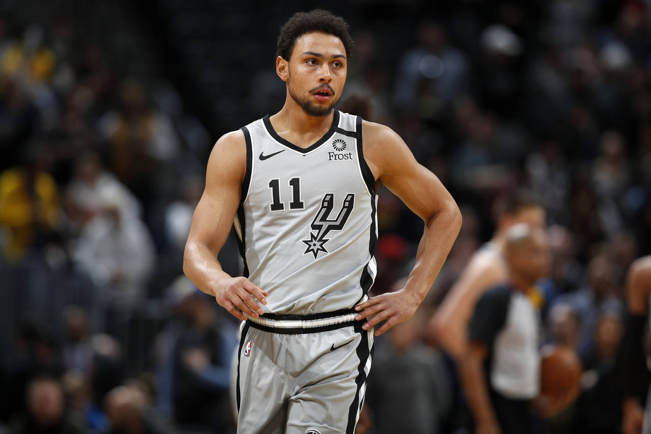 FILE - San Antonio Spurs guard Bryn Forbes (11) watches during the first half of an NBA basketball ...