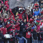 
              Fans cheer their team during the FIFA Club World Cup soccer match between Seattle Sounders FC and Al Ahly FC at the Tangier stadium, in Tangier, Morocco, Saturday, Feb. 4, 2023. (AP Photo/Mosa'ab Elshamy)
            