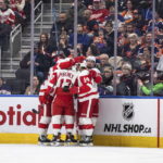 
              Detroit Red Wings players celebrate a goal against the Edmonton Oilers during the second period of an NHL hockey game, Wednesday, Feb.15, 2023 in Edmonton, Alberta. (Jason Franson/The Canadian Press via AP)
            