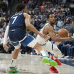 
              Denver Nuggets guard Ish Smith, right, drives past Minnesota Timberwolves guard Wendell Moore Jr. during the second half of an NBA basketball game Tuesday, Feb. 7, 2023, in Denver. (AP Photo/David Zalubowski)
            