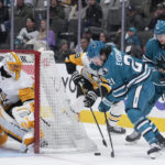 
              San Jose Sharks center Michael Eyssimont (21) prepares to shoot against Pittsburgh Penguins goaltender Casey DeSmith, left, during the first period of an NHL hockey game in San Jose, Calif., Tuesday, Feb. 14, 2023. (AP Photo/Godofredo A. Vásquez)
            