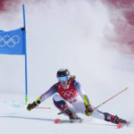 
              FILE - Paula Moltzan of United States makes a turn during the first run of the women's giant slalom at the 2022 Winter Olympics, Monday, Feb. 7, 2022, in the Yanqing district of Beijing. When Paula Moltzan finished second behind Mikaela Shiffrin for the U.S. ski team’s first 1-2 finish in a women’s World Cup slalom in more than half a century recently, it was easy to assume that her more successful teammate was her main inspiration. (AP Photo/Robert F. Bukaty, File)
            