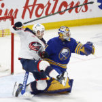 
              Columbus Blue Jackets left wing Eric Robinson and Buffalo Sabres goaltender Craig Anderson collide during the third period of an NHL hockey game, Tuesday, Feb. 28, 2023, in Buffalo, N.Y. (AP Photo/Jeffrey T. Barnes)
            