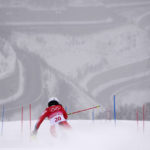 
              FILE - Wendy Holdener of Switzerland passes a gate during the women's combined slalom at the 2022 Winter Olympics, Thursday, Feb. 17, 2022, in the Yanqing district of Beijing. The dearth of candidates to host the Winter Olympics amid spiraling venue costs could force the IOC to resort to lining up a list of fixed, rotating hosts. A highly theoretical list could include Salt Lake City and Vancouver in North America, Pyeongchang in Asia and places like Switzerland, Italy and Scandinavia in Europe.  (AP Photo/Robert F. Bukaty, File)
            