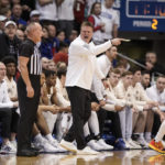 
              Kansas head coach Bill Self has words with an official during the second half of an NCAA college basketball game against West Virginia on Saturday, Feb. 25, 2023, at Allen Fieldhouse in Lawrence, Kan. At right is Kansas guard Gradey Dick (4). Kansas defeated West Virginia, 76-74. (AP Photo/Nick Krug)
            
