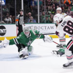 
              Chicago Blackhawks right wing Patrick Kane (88) scores against Dallas Stars goaltender Jake Oettinger (29) in the second period of an NHL hockey game, Wednesday, Feb. 22, 2023, in Dallas. (AP Photo/Tony Gutierrez)
            