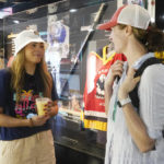 
              Sarah Nurse, left, a Canadian hockey player and two-time Olympic gold medalist, and A.J. Mleczko, right, a former U.S. hockey player and a 1998 Olympic gold medalist, speak while viewing the exhibits inside the United Hockey Mobile Museum, Thursday, Feb. 2, 2023, in Fort Lauderdale, Fla. (AP Photo/Marta Lavandier)
            