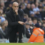 
              Manchester City's head coach Pep Guardiola kneels during the English Premier League soccer match between Manchester City and Wolverhampton at the Etihad Stadium in Manchester, England, Sunday, Jan. 22, 2023. (AP Photo/Dave Thompson)
            