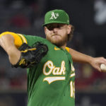 
              FILE - Oakland Athletics starting pitcher Cole Irvin throws to the plate during the first inning of a baseball game against the Los Angeles Angels on Sept. 29, 2022, in Anaheim, Calif. The Baltimore Orioles acquired Irvin from the Oakland Athletics on Thursday, Jan. 26, 2023, along with minor league right-hander Kyle Virbitsky for minor league infielder Darell Hernaiz. (AP Photo/Mark J. Terrill, File)
            