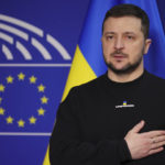 
              Ukraine's President Volodymyr Zelenskyy poses for a picture before an EU summit at the European Parliament in Brussels, Belgium, Thursday, Feb. 9, 2023. On Thursday, Zelenskyy will join EU leaders at a summit in Brussels, which German Chancellor Olaf Scholz described as a "signal of European solidarity and community." (AP Photo/Olivier Matthys)
            
