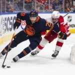 
              Detroit Red Wings' Dylan Larkin (71) chases Edmonton Oilers' Leon Draisaitl (29) during overtime an NHL hockey game Wednesday, Feb. 15, 2023, in Edmonton, Alberta. (Jason Franson/The Canadian Press via AP)
            