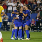 
              United States forward Mallory Swanson, centr, celebrates her goal with Rose Lavell (16), Anti Sullivan (17) and other teammates during the second half of a SheBelieves Cup soccer match against Brazil Wednesday, Feb. 22, 2023, in Frisco, Texas. The United States won 2-0. (AP Photo/LM Otero)
            