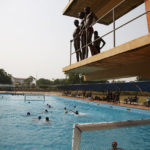 
              Two teams play water polo during an Awatu Winton Water Polo Club competition at the University of Ghana in Accra, Ghana, Saturday, Jan. 14, 2023. Former water polo pro Asante Prince is training young players in the sport in his father's homeland of Ghana, where swimming pools are rare and the ocean is seen as dangerous. (AP Photo/Misper Apawu)
            