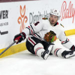 
              Chicago Blackhawks left wing Boris Katchouk tries to gather the puck after falling down in the second period during an NHL hockey game against the Arizona Coyotes, Tuesday, Feb. 28, 2023, in Tempe, Ariz. (AP Photo/Rick Scuteri)
            