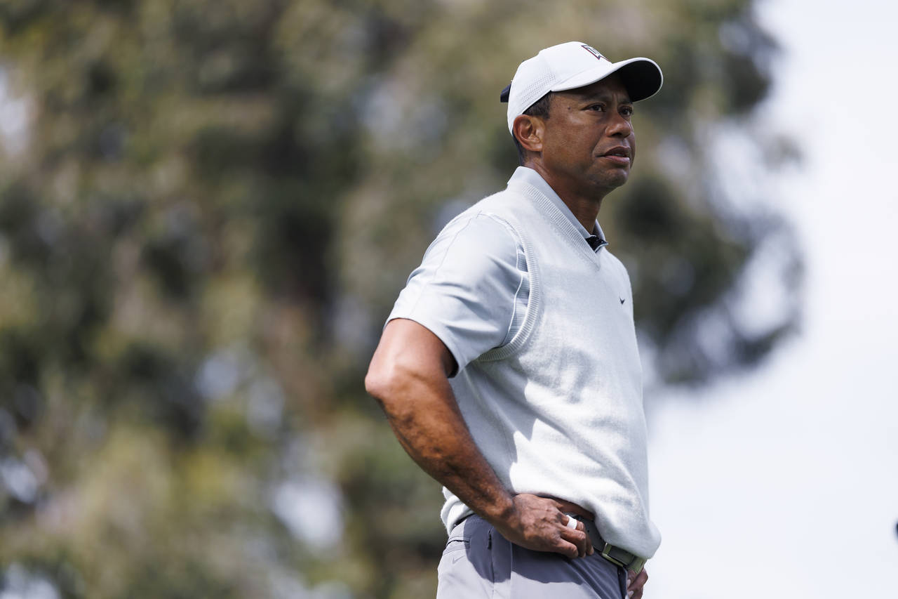 Tiger Woods waits to hit on the 11th hole during the third round of the Genesis Invitational golf t...