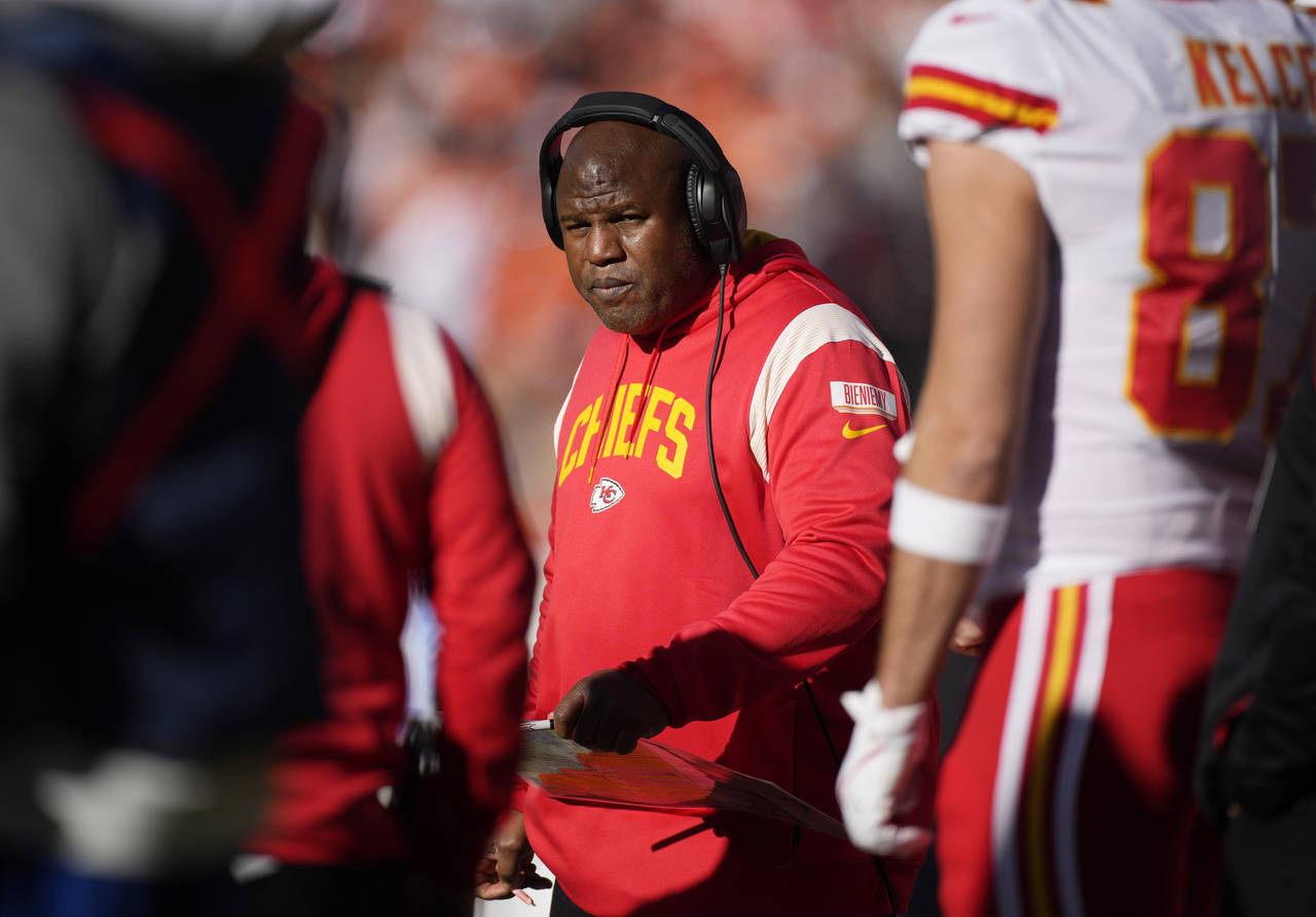 FILE - Kansas City Chiefs offensive coordinator Eric Bieniemy watches during the first half of the ...