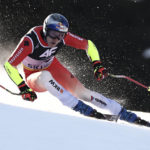 
              Switzerland's Marco Odermatt speeds down the course during an alpine ski, men's World Championship super-G race, in Courchevel, France, Thursday, Feb. 9, 2023. (AP Photo/Gabriele Facciotti)
            