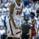 
              Alabama forward Brandon Miller (24) reacts after a score during the second half of an NCAA college basketball game against Arkansas, Saturday, Feb. 25, 2023, in Tuscaloosa, Ala. (AP Photo/Vasha Hunt)
            