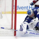 
              Tampa Bay Lightning goaltender Andrei Vasilevskiy (88) makes a diving save on a shot by the Colorado Avalanche during the first period of an NHL hockey game Thursday, Feb. 9, 2023, in Tampa, Fla. (AP Photo/Chris O'Meara)
            