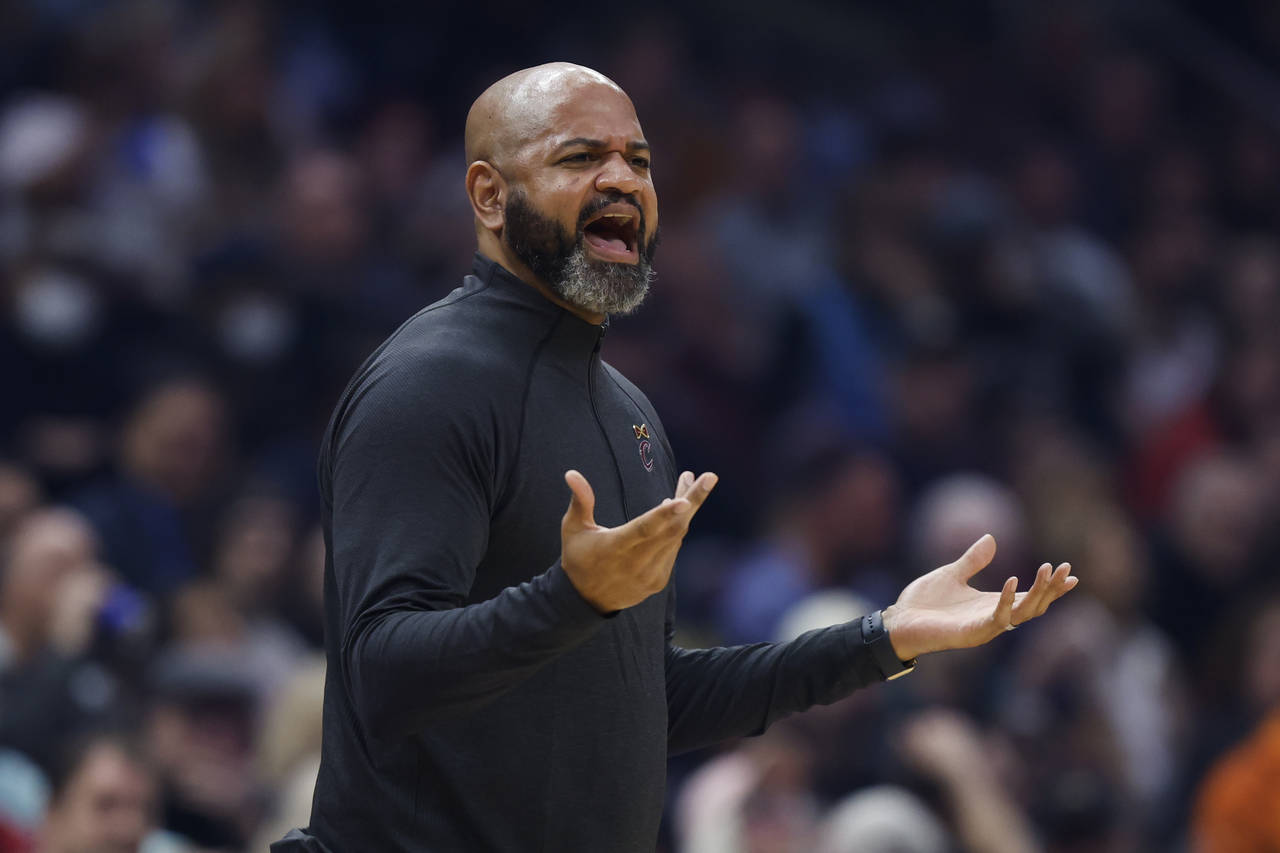 Cleveland Cavaliers head coach J.B. Bickerstaff reacts after a call during the first half of an NBA...