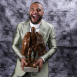 
              Walter Payton Player of the Year Award winner, Dallas Cowboys' Dak Prescott, poses for a photo during the NFL Honors award show ahead of the Super Bowl 57 football game, Thursday, Feb. 9, 2023, in Phoenix. (AP Photo/Ross D. Franklin)
            