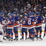 
              New York Islanders' Zach Parise (11) and goaltender Ilya Sorokin (30) celebrate with teammates after an NHL hockey game against the Seattle Kraken Tuesday, Feb. 7, 2023, in Elmont, N.Y. The Islanders won 4-0. (AP Photo/Frank Franklin II)
            