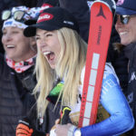
              United States' Mikaela Shiffrin celebrates with her team after winning gold in an alpine ski World Championships giant slalom, in Meribel, France, Thursday, Feb. 16, 2023. (AP Photo/Alessandro Trovati)
            