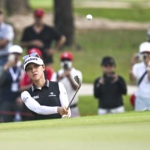 
              Lydia Ko of New Zealand watches her shot on the 1st hole during the first round of the LPGA Honda Thailand golf tournament in Pattaya, southern Thailand, Thursday, Feb. 23, 2023. (AP Photo/Kittinun Rodsupan)
            
