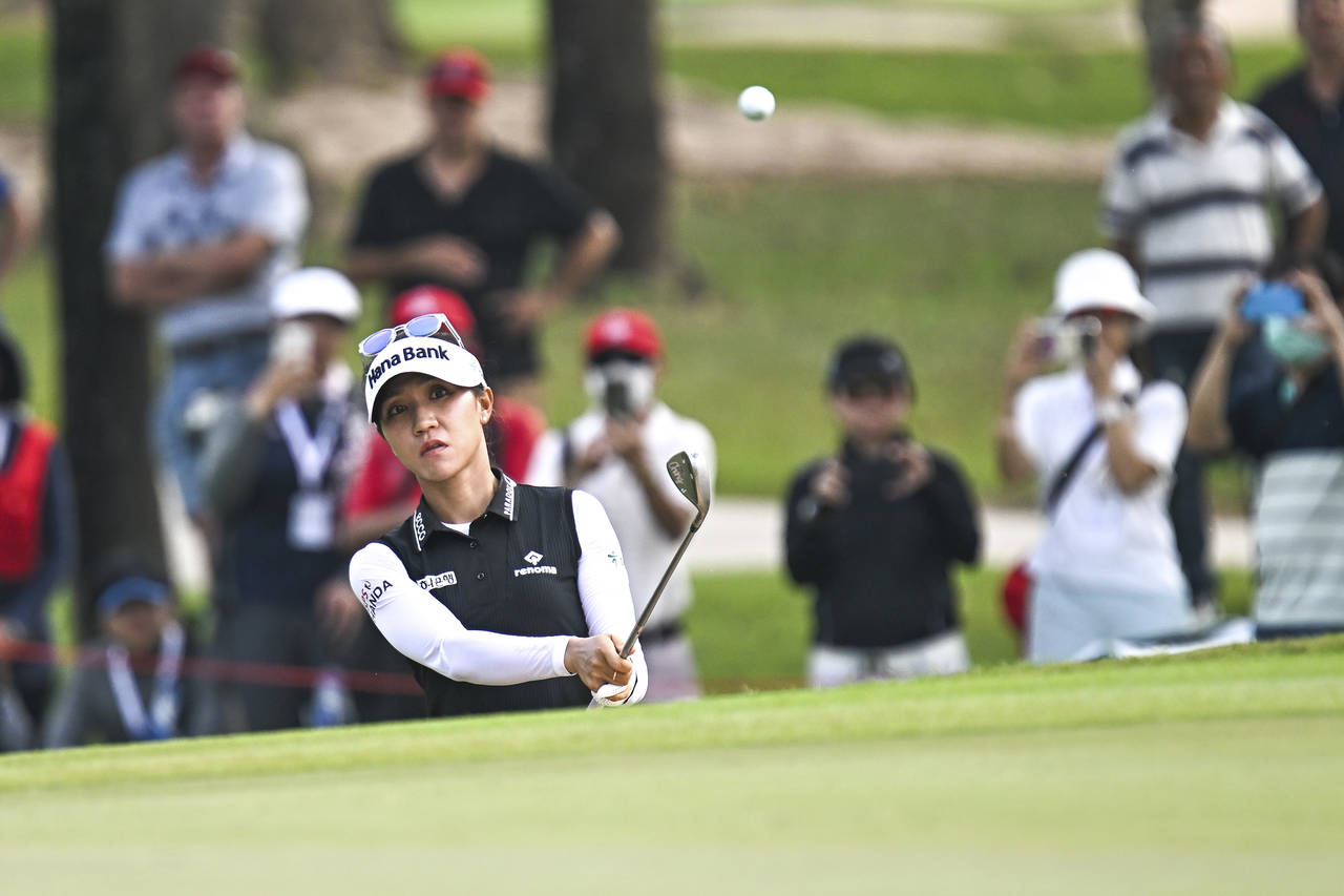 Lydia Ko of New Zealand watches her shot on the 1st hole during the first round of the LPGA Honda T...