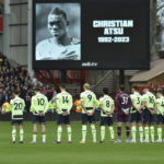 
              Players pay a minute of silence as tribute to Christian Atsu who died in the Turkey earthquake ahead the English Premier League soccer match between Nottingham Forest and Manchester City at City ground in Nottingham, England, Saturday, Feb. 18, 2023. (AP Photo/Rui Vieira)
            