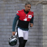 
              Philadelphia Eagles' Jalen Hurts jogs to practice at the NFL football team's training facility, Friday, Feb. 3, 2023, in Philadelphia. The Eagles are scheduled to play the Kansas City Chiefs in Super Bowl LVII on Sunday, Feb. 12, 2023. (AP Photo/Matt Slocum)
            