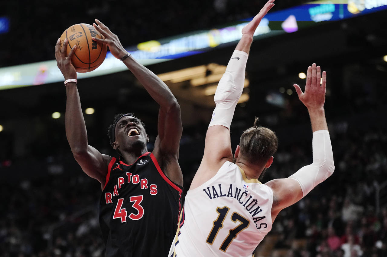 Toronto Raptors forward Pascal Siakam (43) shoots over New Orleans Pelicans center Jonas Valanciuna...