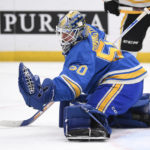 
              St. Louis Blues goaltender Jordan Binnington makes a save against the Pittsburgh Penguins during the first period of an NHL hockey game, Saturday, Feb. 25, 2023, in St. Louis. (AP Photo/Jeff Le)
            