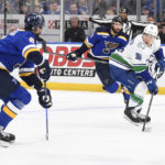 
              Vancouver Canucks left wing Andrei Kuzmenko (96) skates against St. Louis Blues defenseman Marco Scandella (6) during the first period of an NHL hockey game Thursday, Feb. 23, 2023, in St. Louis. (AP Photo/Jeff Le)
            